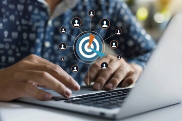 A business person uses a laptop to create target audience ICONS,Digital marketing online, CRM, Data exchanges development and customer service.