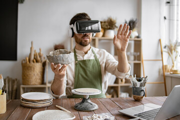 Sculptor using virtual reality glasses to sculpt clay bowl. Modern technology enhances precision and creativity in traditional pottery studio setting. Scene blends innovation with craftsmanship.