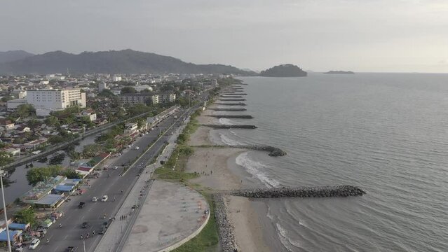 Establish aerial view of the Padang city landmark near the taplau coast of West Sumatra. d-log raw stock video