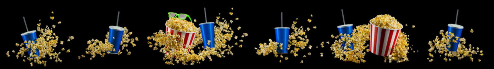 Blue cup with cap and flying popcorn isolated on black background