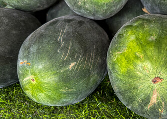 Watermelons on the counter in the market