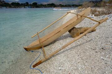 Indonesia Alor Island - Handmade wooden outrigger fishing boat