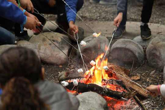 Kids enjoy roasting marshmallows at camp in Ojai, California.