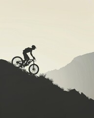 Obraz premium The silhouette of a cyclist leads the way along a mountain path.