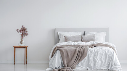 Minimalist bedroom interiors with minimal decor, neutral colors and copyspace for text. Interior design home decor composition.