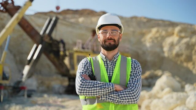 Portrait of engineer geologist at quarry