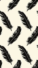 Obraz premium Black feathers on a white background