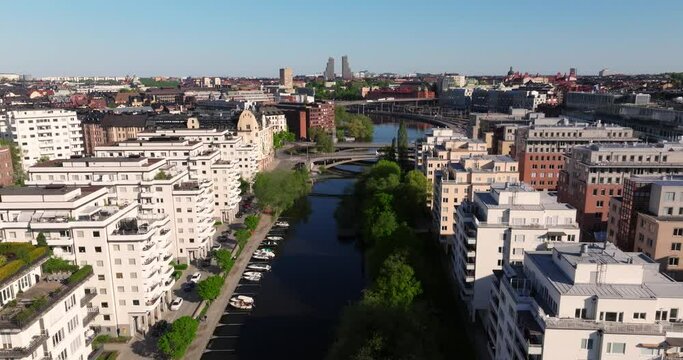 Aerial Pullback Away from Klara Sjo Canal in Stockholm, Sweden. Summer Day