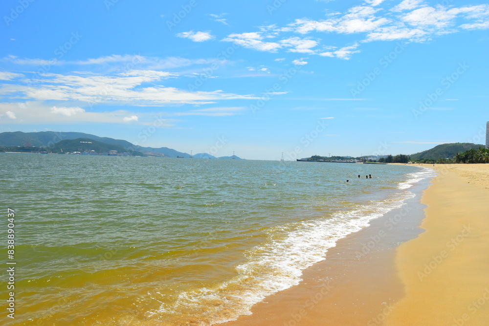 Wall mural nha trang city, vietnam - october 15, 2023 : overlooking the beautiful coast of nha trang with palm 