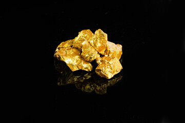 Closeup of big gold nugget finance concept