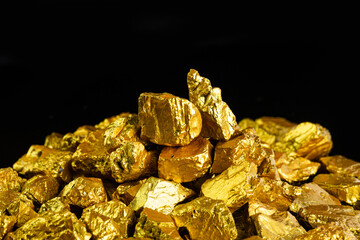 Closeup of big gold nugget finance concept