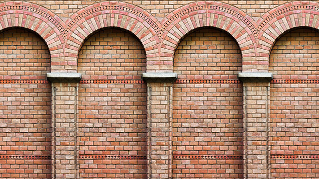 Old brick wall with a pattern of arches