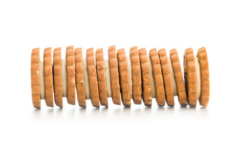 Sandwich Cookies with a cream filling isolated on white background.