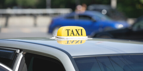 Taxi in the city street at summer.
