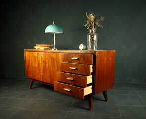 vintage furniture and accessories on a dark background