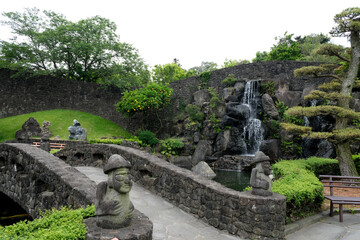 Spirited garden in Jeju island, South Korea. Dol Harubang as a symbol of Island