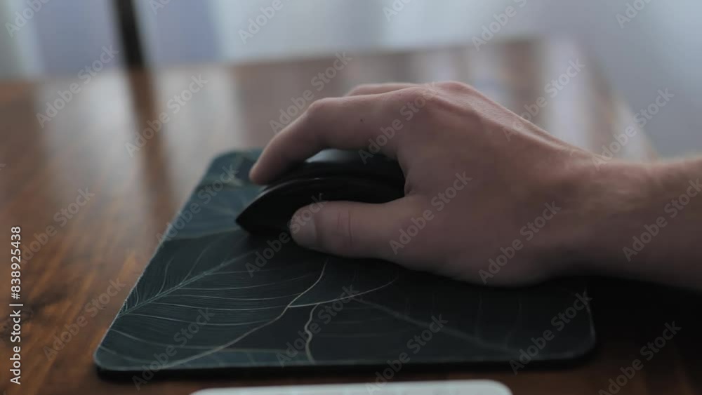 Aufkleber man hand clicking buttons on pc mouse. person thinking and working. close up of pc mouse