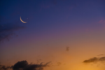 Background of half moon and starry sky and sunset Greeting card for the holy month of Ramadan of...