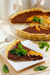 Chocolate tart with oranges.