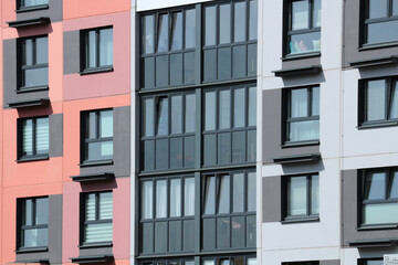 Fototapeta premium Windows and balconies of a multi -storey residential building.