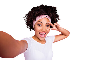 Self-portrait of her she nice-looking charming cute winsome adorable magnificent attractive lovely cheerful cheery crazy wavy-haired girl showing v-sign having fun isolated over pink pastel background