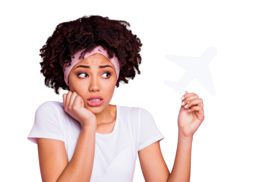 Close-up portrait of her she nice-looking shine charming cute attractive lovely afraid wavy-haired girl holding in hand plane phobia panic attack isolated over pink pastel background