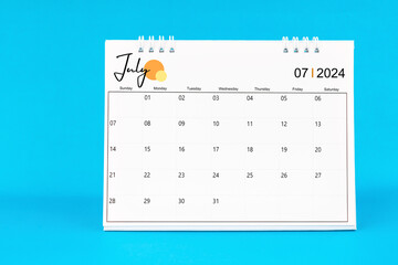 July 2024, Monthly desk calendar for 2024 year on Blue background.