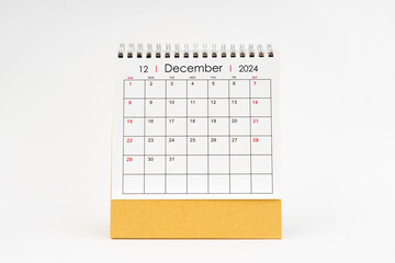 2024 December monthly desk calendar isolated on white.