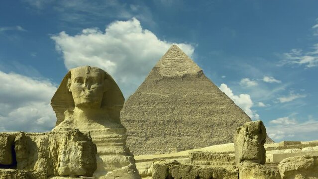 Clouds over great pyramid and sphinx in Egypt, timelapse 4k
