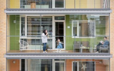 Family spending time together on balcony