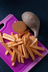 Sliced and whole sweet potato