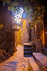 Beautiful medieval village Talasnal in Lousa, Portugal on a beautiful day. Child playing on the...