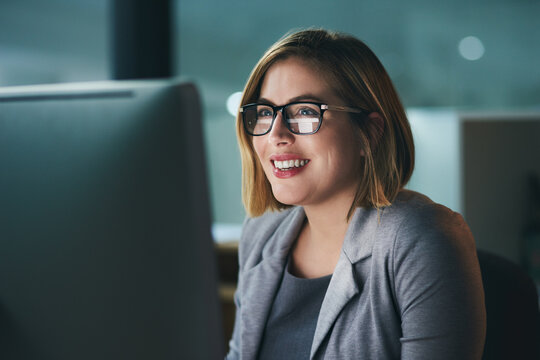 Computer, business woman and glasses in office for reading email, planning and working overtime. Professional, night and receptionist for administration, research deadline and information on desktop