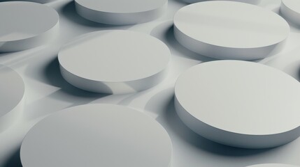 Abstract image of white, three-dimensional circular shapes with soft shadows on a light background, creating a minimalistic and modern look.