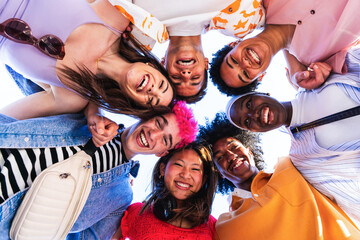 Multiethnic group of young happy friends hanging out in the city - Multiracial group of students...