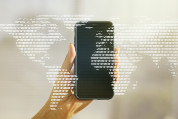 Double exposure of abstract digital world map and hand with cellphone on background, big data and blockchain concept
