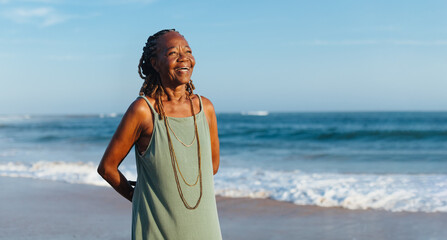 Mature woman with braids enjoying a casual day at the seaside