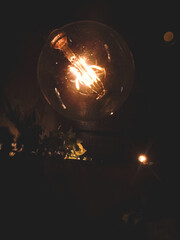 Light bulb on black background