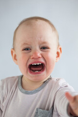 Portrait of screaming baby girl