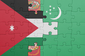 puzzle with the colourful national flag of turkmenistan and flag of jordan .