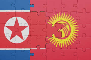 puzzle with the colourful national flag of kyrgyzstan and flag of north korea .