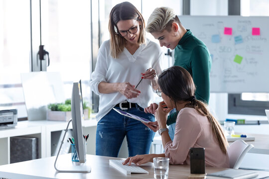 Businesswomen using digital tablet at the office