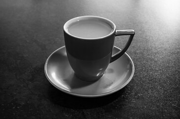 cup with  coffee  on the table