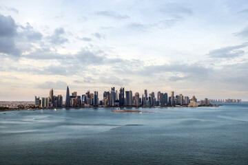 Obraz premium Beautiful aerial view of Doha skyline during sunset sunrise