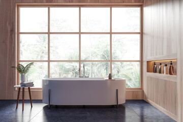 Luxury hotel bathroom interior with white tub, shelf and panoramic window