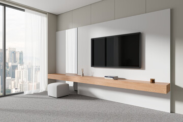 Modern home living room interior with tv screen, pouf seat and window