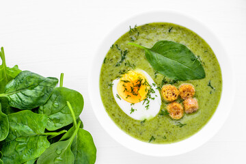 Green soup. Broccoli spinach cream soup in a bowl.