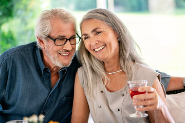 Happy senior couple on a family celebration