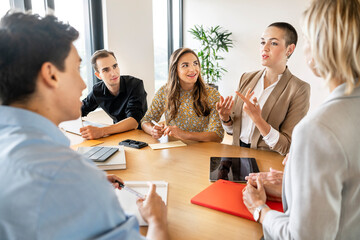 Business people having a workshop in office, discussing plans