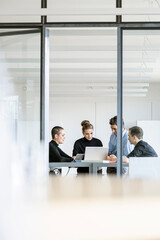 Young business people having a meeting in office